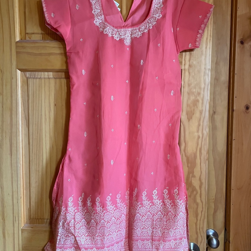 Women’s shalwar kameez. Never worn. Coral colored with digital print .